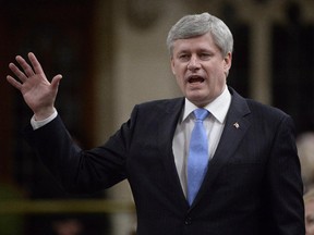 Prime Minister Stephen Harper answers a question during question period in the House of Commons in Ottawa on Feb. 26, 2015. The federal government will introduce its long-anticipated motion to expand and extend Canada's war against the Islamic State of Iraq and the Levant on Tuesday and will seek Parliament's permission for airstrikes against targets in Syria, federal sources say.