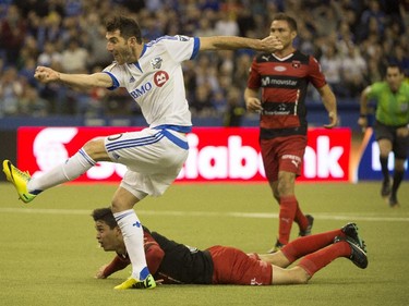 Montreal Impact's Ignacio Piatti scores against LD Alajuelense during first half CONCACAF soccer semi-final action Wednesday, March 18, 2015,in Montreal.