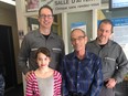 The man who "died" thanking the folks who brought him back to life. L-R: Alicia (granddaughter), Jean-Robert Pelletier (paramedic) Pierre Lachapelle, and Christian Fleury (paramedic).