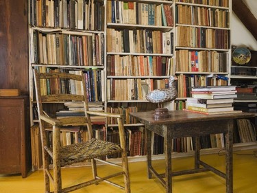 In the reading room, thousands of books line the shelves, mostly all on the subject of antiques.