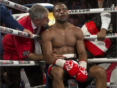 Jean Pascal, from Montreal, rests between rounds during his world championship fight against Sergey Kovalev,from Russia on Saturday, March 14, 2015 in Montreal. Kovalev defended his World Boxing Association, International Boxing Federation and World Boxing Organization light-heavyweight titles.THE CANADIAN PRESS/Ryan Remiorz