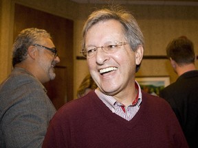 Jean Tremblay, mayor of Saguenay, smiles after speaking to reporters in Saguenay, Que., on Saturday, September 1, 2012.
