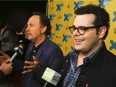 Josh Gad, right, and Billy Crystal talk to the press on the red carpet for "The Comedians" during the South by Southwest Film Festival on Sunday, March 15, 2015 in Austin, Texas.