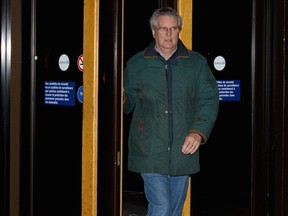 William Kokesch leaves the Montreal courthouse after being released on bail on charges of possession, distribution and production of child pornography on Thursday, Dec. 27, 2012.