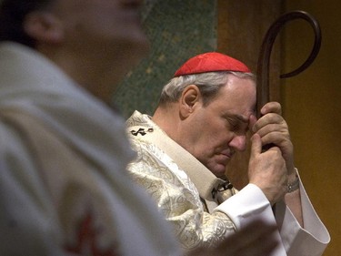 Cardinal Turcotte rests against his cane during the mass held for the death of Pope John Paul II at Mary Queen of the World Cathedral. PHOTO DAVE SIDAWAY/CITY
"Humanity is better today because he lived," said Cardinal Jean-Claude Turcotte, photographed during yesterday's commemorative mass for John Paul II at Montreal's Mary Queen of the World Cathedral.