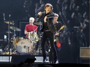 This Feb. 26, 2014 file photo shows Mick Jagger and the Rolling Stones performing during their concert at Tokyo Dome in Tokyo. The rock band announced a 15-city stadium tour Tuesday, March 31, 2015, that will kick off May 24 in San Diego.