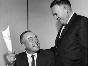 Montreal Canadiens gruff but massively successful coach Toe Blake (left) with then-general manager Sam Pollock on June 29, 1966 after signing a new one-year contract to coach the Habs.