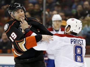 Montreal Canadiens right wing Brandon Prust, right, and Anaheim Ducks left wing Patrick Maroon brawl during the first period of an NHL hockey game in Anaheim, Calif., Wednesday, March 4, 2015.