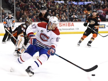 Max Pacioretty (67) of the Montreal Canadiens turns for a rebound after his shot in front of John Gibson (36) and Jiri Sekac (46) during the second period at Honda Center on March 4, 2015 in Anaheim, California.