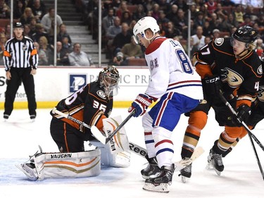 John Gibson (36) of the Anaheim Ducks reacts to a shot as Lars Eller (81) of the Montreal Canadiens looks for a rebound with Hampus Lindholm (47) during the second period at Honda Center on March 4, 2015 in Anaheim, California.