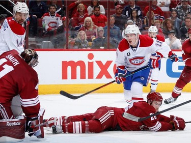 Brendan Gallagher #11 of the Montreal Canadiens shoots the puck on goaltender Mike Smith #41 of the Arizona Coyotes during the seocnd period of the NHL game at Gila River Arena on March 7, 2015 in Glendale, Arizona.