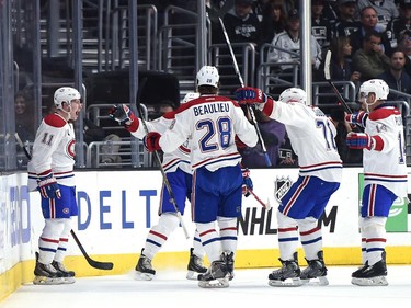 Brendan Gallagher (11) of the Montreal Canadiens reacts to his teammates after his goal to tie the game 2-2 with the Los Angeles Kings during the second period at Staples Center on March 5, 2015 in Los Angeles, California.