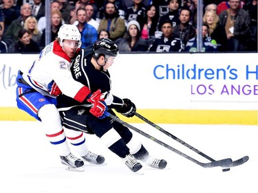 Jacob De La Rose (25) of the Montreal Canadiens prevents a shot on a breakaway from Nick Shore (37) of the Los Angeles Kings during the second period at Staples Center on March 5, 2015 in Los Angeles, California.