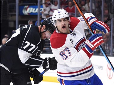 Max Pacioretty (67) of the Montreal Canadiens celebrates his goal in front of Jeff Carter (77) of the Los Angeles Kings to take a 3-2 lead during the third period at Staples Center on March 5, 2015 in Los Angeles, California.