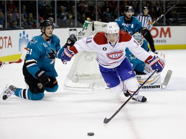 Brendan Gallagher (#11) of the Montreal Canadiens skates to the puck against the San Jose Sharks at SAP Center on March 2, 2015 in San Jose, California.