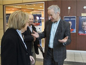 David Birnbaum, right, talking to voters while campaigning in the Cavendish Mall in Cote St-Luc on April 5, 2014.