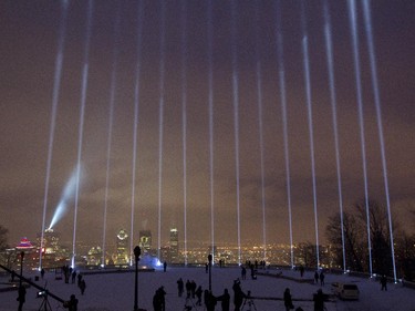 Fourteen beams of light pointing skywards at the Mont Royal Chalet in Montreal, Saturday December 6, 2014.  It was part of a day of commemorations to mark the 25th anniversary of the murder of 14 women at the École Polytechnique, by Marc Lépine.