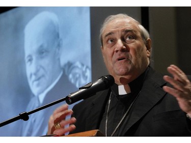 Cardinal Jean-Claude Turcotte, Archbishop of Montreal, speaks at a press conference at St. Joseph's Oratory in Montreal Friday, February 19, 2010 about the canonization of  Brother André (his image is on the left) to sainthood in the Roman Catholic Church. (THE GAZETTE/John Kenney)