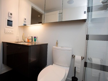 The bathroom, with digital control panel, in the home of Alan Kezber and Martine Diffley Kezber, not seen, in Montreal on Tuesday, February 24, 2015.