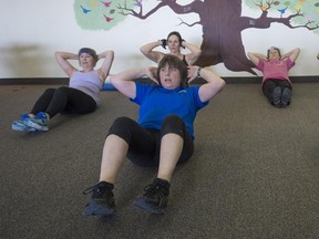 Carolynn Morin left, leads a class at Core Fitness. “You can exercise virtually anywhere," she says, "but it’s the human connection that you can’t get everywhere.”