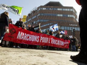 Anti-austerity protesters  at a February march denounced cuts to universities and Fonds de recherche du Québec.   The protest was organized by the FEUQ.