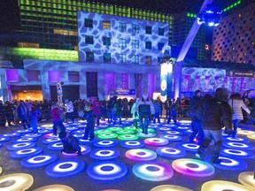 A dance party at the Quartier des spectacles  for Nuit blanche is seen in this 2015 file photo.
