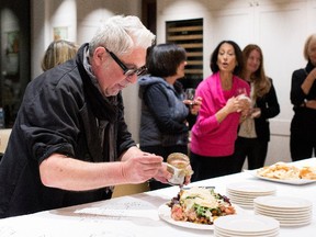 Asher Adler puts the final touches on a dish in Montreal on Thursday February 5, 2015. Adler was cooking for a small dinner party at the home of Susan and Jonathan Wenet's fundraiser for the Miriam Foundation.