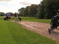 Golfers head out onto the Meadowbrook Golf Course in Montreal Thursday, August 28, 2014.