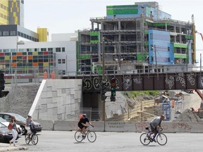 Construction at the MUHC super hospital project in Montreal, on Monday, June 23, 2014, with the de Maisonneuve and Decarie Blvd. underpass in the foreground.