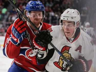 Montreal Canadiens defenseman Jeff Petry collides with Ottawa Senators centre Kyle Turris during the first period at the Bell Centre in Montreal on Thursday, March 12, 2015.