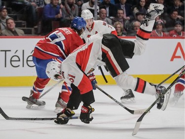Ottawa Senators right wing Mark Stone falls during the first period against the Montreal Canadiens at the Bell Centre on Thursday, March 12, 2015.