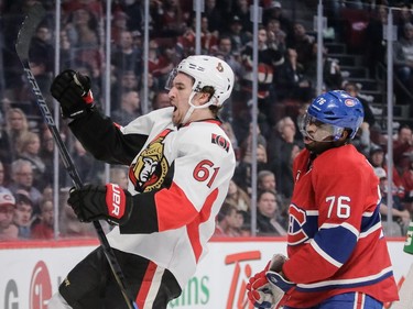 Ottawa Senators right wing Mark Stone celebrates his goal as  P.K. Subban reacts during the third period at the Bell Centre on Thursday, March 12, 2015.