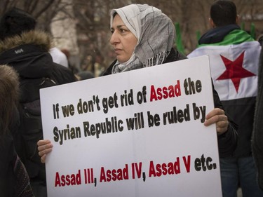 Demonstrators in Montreal march on the fourth anniversary of the start of uprising against the Syrian government and are calling for democracy for the people of Syria on Saturday, March 15, 2014.