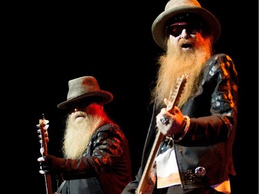 ZZ Top members Dusty Hill, left, and Billy Gibbons perform at the Bell Centre on Tuesday, March 17, 2015.