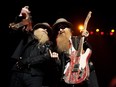 ZZ Top members Dusty Hill, left, and Billy Gibbons perform at the Bell Centre on Tuesday, March 17, 2015.