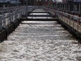 Water is pumped from one tank to the next during the grit removal process at the Montreal sewage treatment facility in Montreal on March 23, 2015.