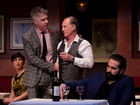 Shawn Campbell, centre left, in the role of Andrew, speaks with Ron Lea, in the role of Michael, as Melanie Sirois, left, who plays Caroline, and Guido Cocomello, who plays Marcello, listen to them in Vittorio Rossi's The Envelope.