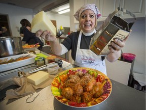 Nonna Mimma (Fabrizio) finishes off a traditional Sicilian dish at the Leonardo Da Vinci Centre culinary academy.