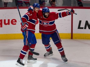 Canadiens defenceman P.K. Subban celebrates with Max Pacioretty, left, after Pacioretty scored the game-winning goal in overtime against Florida Panthers goalie Roberto Luongo during NHL action at the Bell Centre in Montreal on Saturday March 28, 2015.