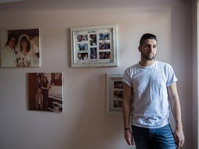 Nineteen-year-old Anthony Pacella poses next to family photos featuring his late mother, Mary Melillo Pacella, at his home in Montreal. Since the death of his mother from lung cancer in 2011, Anthony has been organizing a bowling fundraiser in her name called StrikeOut Cancer; the money raised goes to the St. Mary's Hospital Foundation.