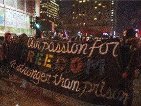 Protester gather at Place Emilie Gamelin in preparation for a march through the streets of Montreal protesting against the Quebec government's austerity measures Monday, March 30, 2015. The park will be closed for renovations until May.