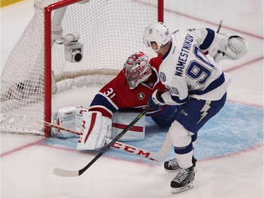 Tampa Bay Lightning's Vladislav Namestnikov scores on Montreal Canadiens goalie Carey Price during second-period action in Montreal on Monday, March 30, 2015.