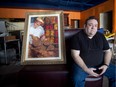 MONTREAL, QUE.: MARCH 5, 2015 -- Abie Haim with a portrait of his late father Johnny Haim at the new location of his restaurant, Abie's, in the Pointe-Claire area of Montreal Thursday, March 5, 2015. Abie's has offered West Islanders a taste of the upper Main since 1999. But in January, the popular West Island deli closed its doors. The windows of the St. John Blvd. establishment were papered up. No signs were left on the windows telling customers what had happened. Abie Haim, Abie's owner said he had to close down because his lease had ended and he couldn't agree to the new terms. He is in the process of renovating a new space  in the Blue Haven shopping mall and preparing to open up soon. Johnny, who died in 2012, and Abie both worked at Schwartz's on St. Laurent Blvd. (John Kenney / MONTREAL GAZETTE)