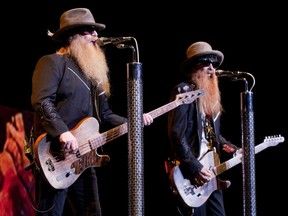 Dusty Hill (left) and guitarist Billy Gibbons of ZZ Top in 2012: The trio returns to the Bell Centre March 17.