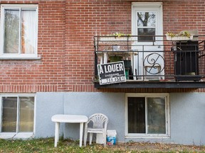A balcony with a For Rent sign on an apartment building on Barclay avenue in the borough of Côte-des-Neiges in Montreal on Saturday, November 8, 2014.