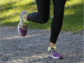 MONTREAL, QUE.: SEPTEMBER 25, 2014 -- Fitness reporter Jill Barker jogging in Montreal on a path near Park Ave. Wednesday, September 25, 2014. (John Kenney / THE GAZETTE) ORG XMIT: 51063