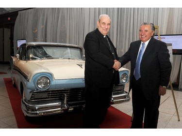 Portage gala honouree Lino Saputo congratulates Cardinal Jean-Claude Turcotte, winner of the 1957 Ford Fairlane Saputo generously donated