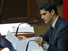 City council speaker Harout Chitilian looks through notes during city council meeting at Montreal City Hall Monday, October 22, 2012.