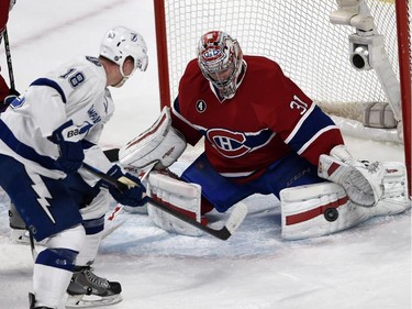 Tampa Bay Lightning left wing Ondrej Palat is stopped by Carey Price during first-period action at the Bell Centre on Tuesday, March 10, 2015.