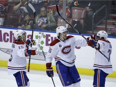 Montreal Canadiens defenseman P.K. Subban, right, celebrates with P.A. Parenteau (15) and Jacob De La Rose (25) after scoring a goal against the Florida Panthers on Tuesday, March 17, 2015,  in Sunrise, Fla.